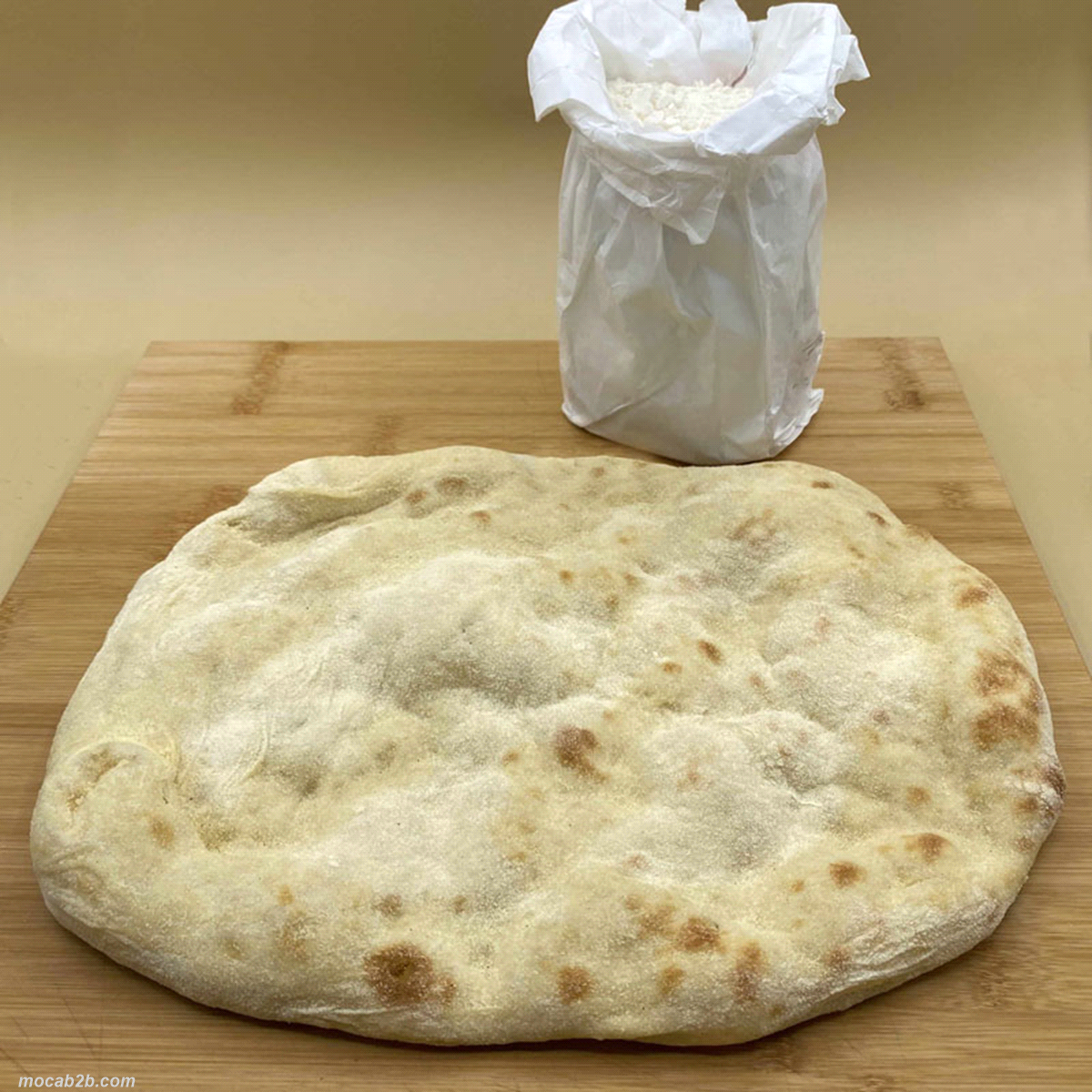 Base pizza di frumento bianco, formato pala 39x29 cm. Surgelata. 