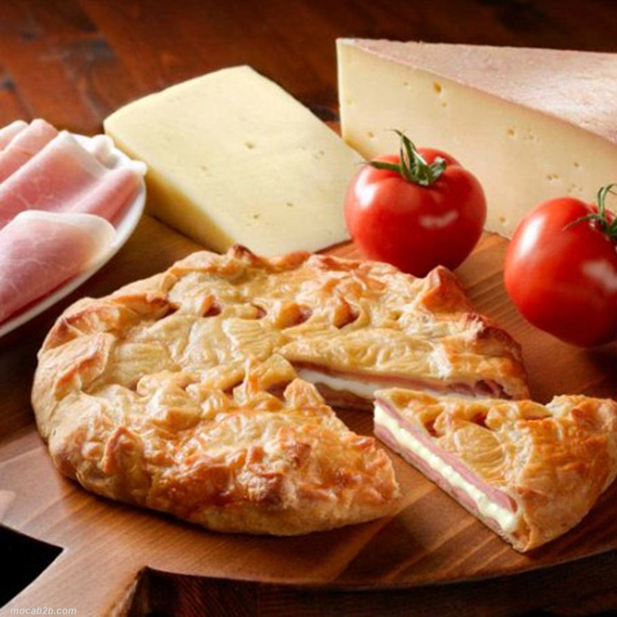 Prodotto alimentare surgelato. Prosciutto cotto e fontina valdostana ricoperti da una delicata sfoglia. 