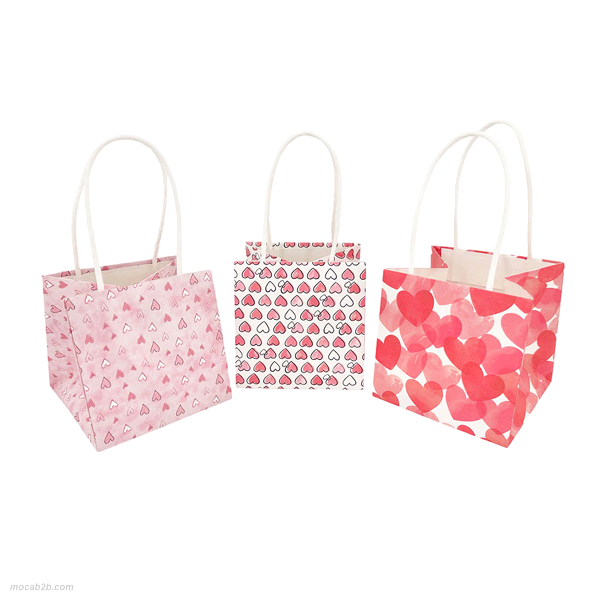 Sacchetto di carta con stampa a cuori confezione da 6pz. Dimensioni: 10,5x10,5x10,5cm. 