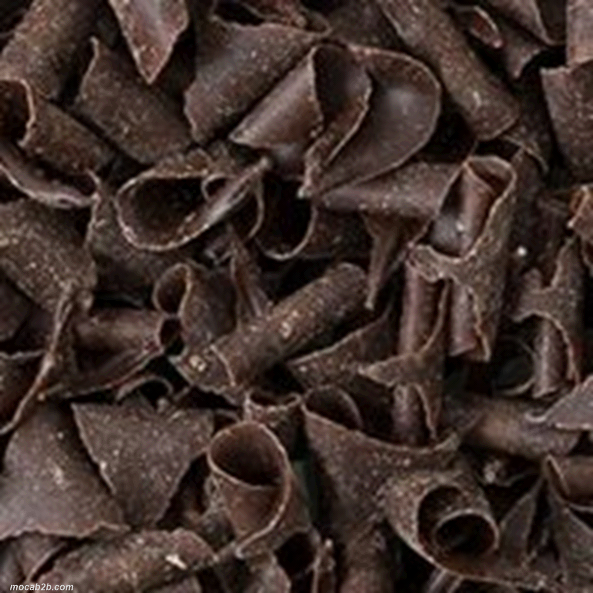 Decorazioni in cioccolato fondente modellate a forma di ricciolo.
 Vaschetta da 700 g . 